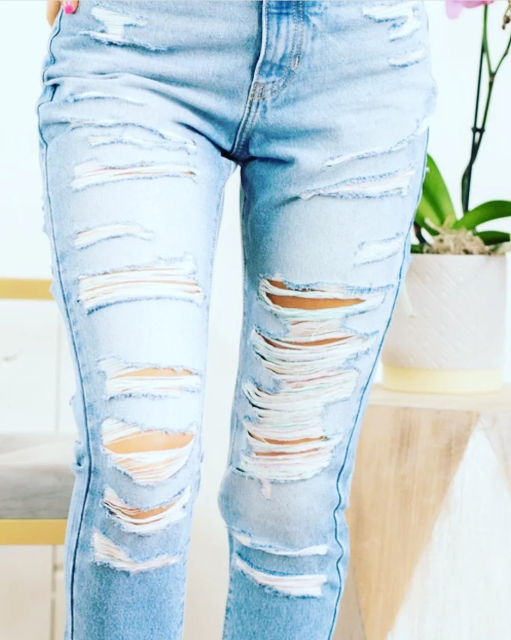 Distressed colored thread denim pants